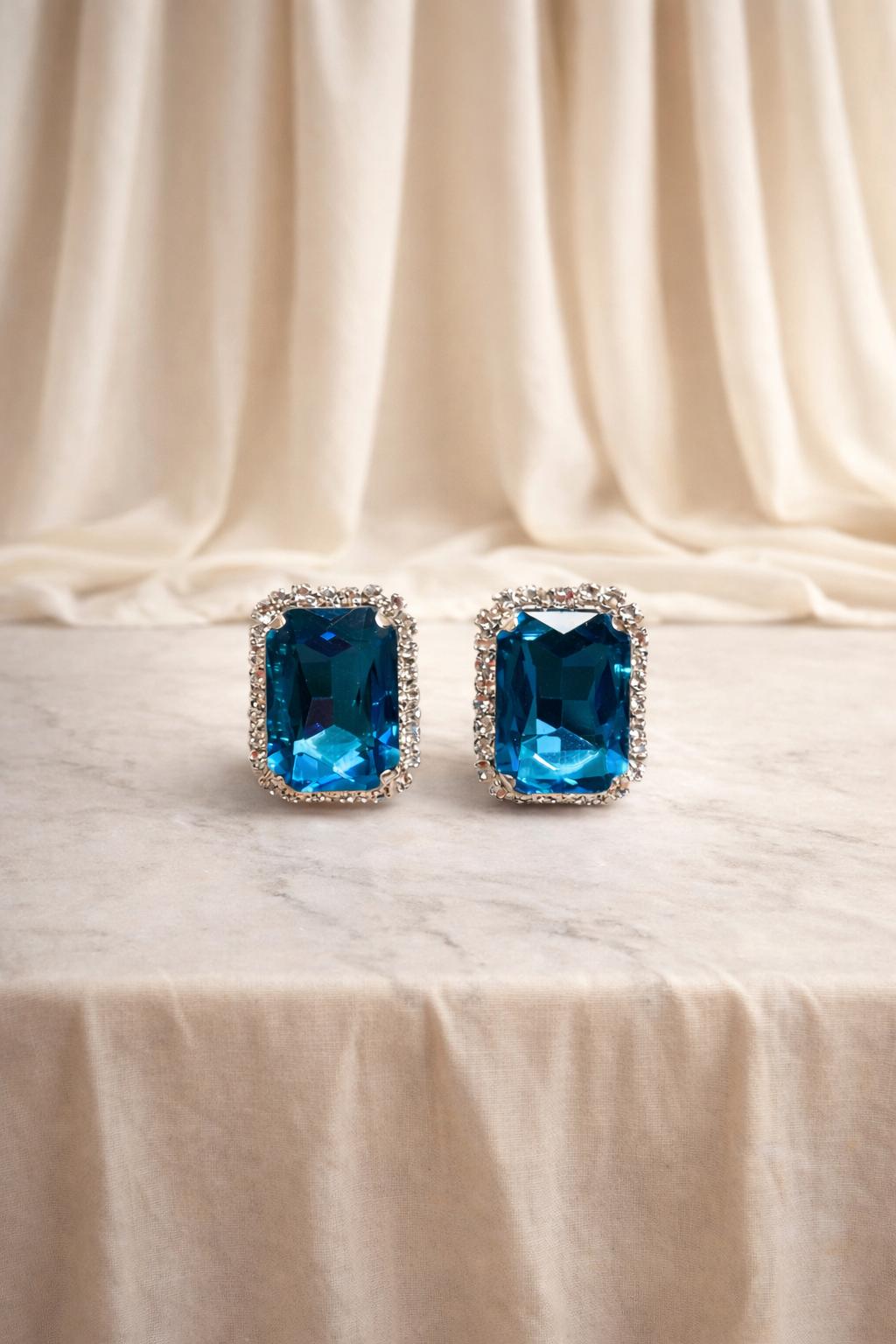Nayvya Royal Azure Emerald-Cut Blue Diamond Halo Stud Earrings